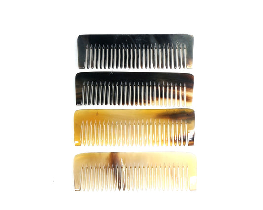 Four Cathcart Elliot Personalised multi-coloured handmade real horn mini pocket combs (4 inches) with unique marbled patterns are arranged vertically on a white background. Each glossy pocket-size comb has evenly spaced teeth.