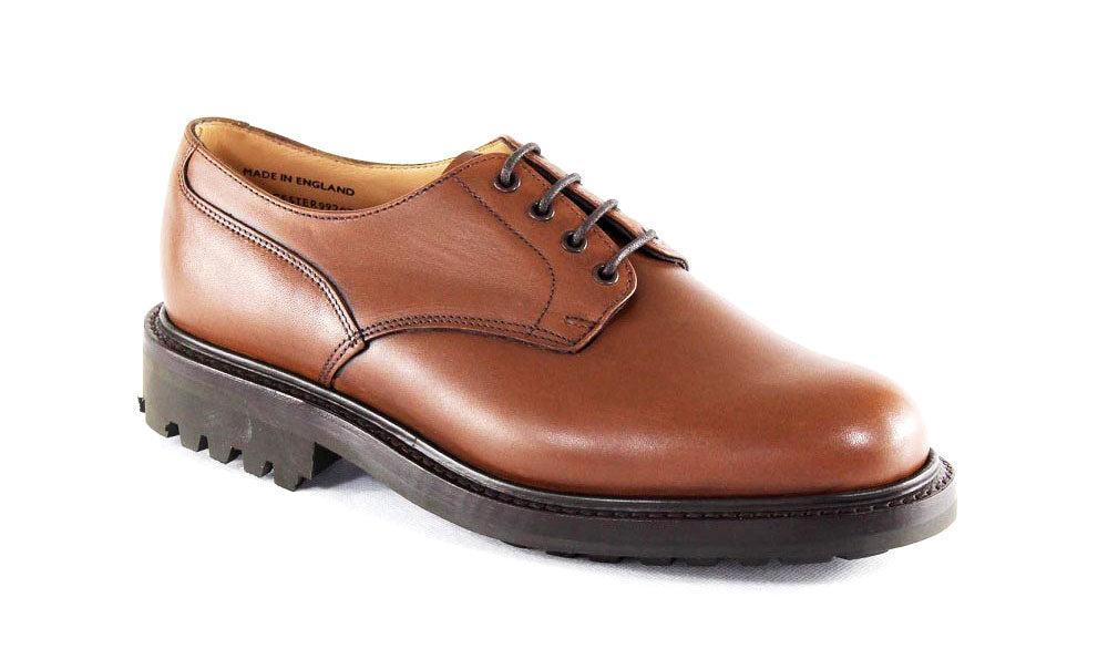 The Sanders WORCESTER Mens Brown Derby Shoe features black laces, a low heel, and a thick Commando rubber sole. Goodyear welted for durability and classic style, its photographed on a white background.