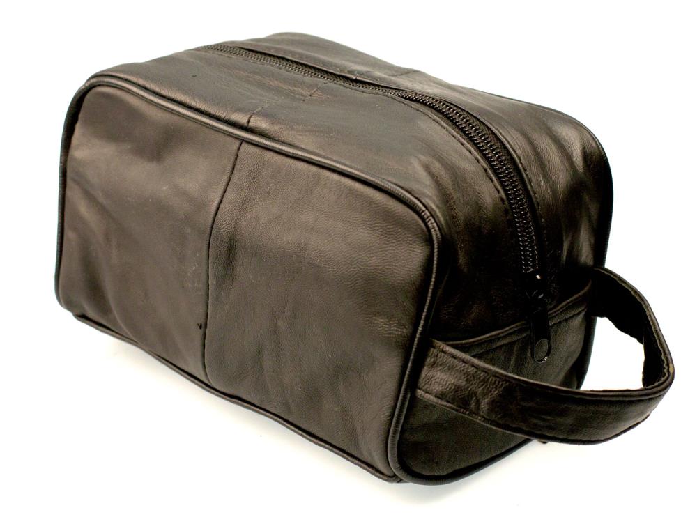 The Cathcart Elliot Small Leather Shoe Care / Wash Bag by Cathcart Elliot is a black leather pouch with a top zipper and side handle, ideal as a compact kit bag, shown against a white background.