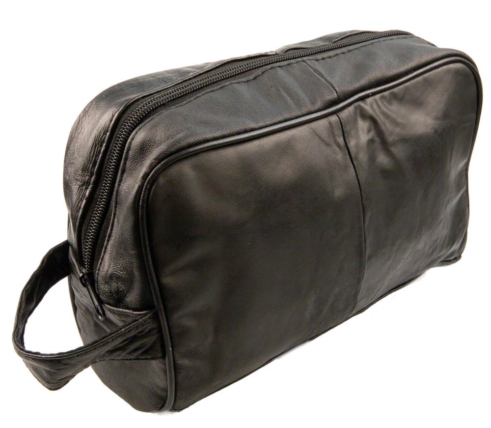 The large leather washbag from Cathcart Elliot in black features a zippered top, side handle, and sleek rectangular design with a smooth texture, positioned to highlight the front and side.