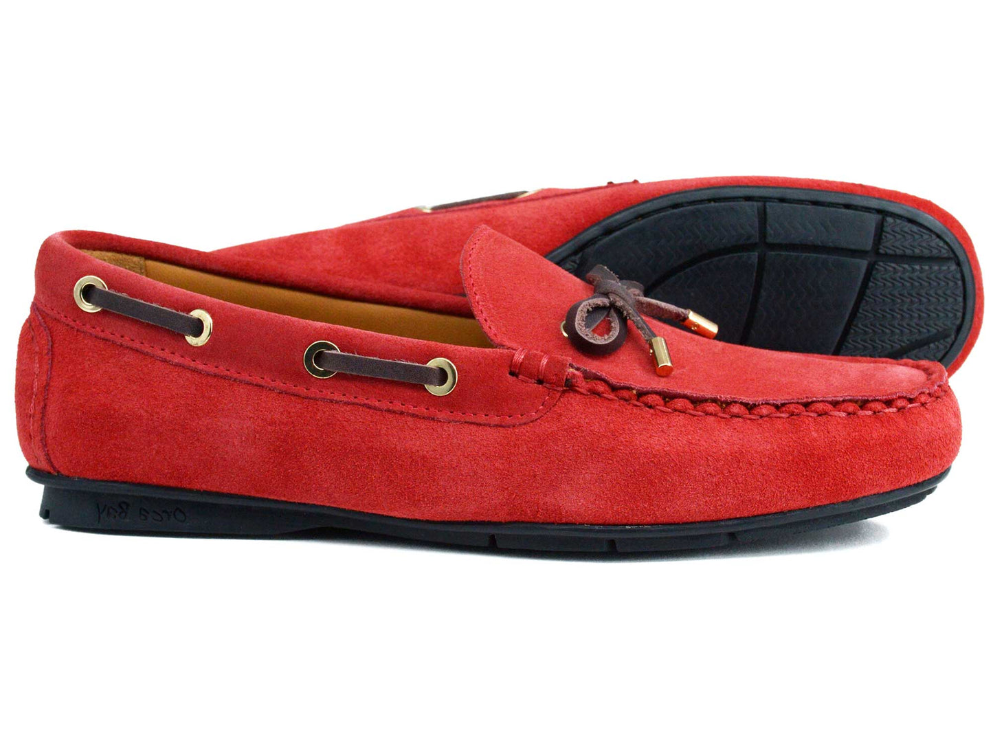 The Orca Bay VIENNA Ladies Red Suede Buckle Loafers feature black soles, brown leather laces, and gold eyelets. One loafer stands upright; the other is on its side showing the textured sole.