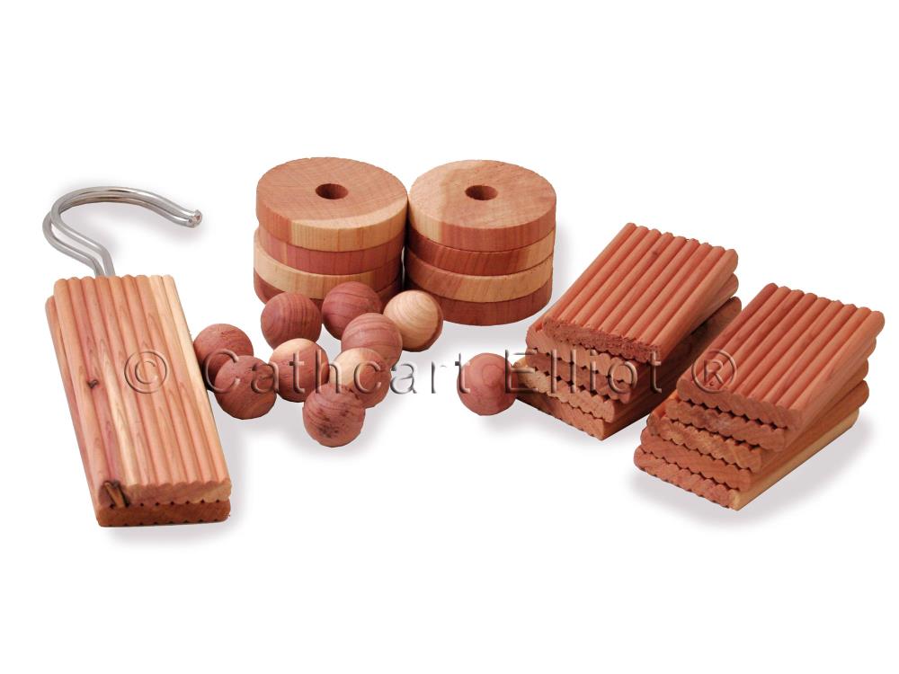 Cathcart Elliots cedar balls blocks pack features aromatic red cedar wood accessories, including rings, balls, and hangable blocks with hooks. These natural insect repellents serve as moth deterrents while adding a fresh scent to your space and are elegantly arranged on a white background.