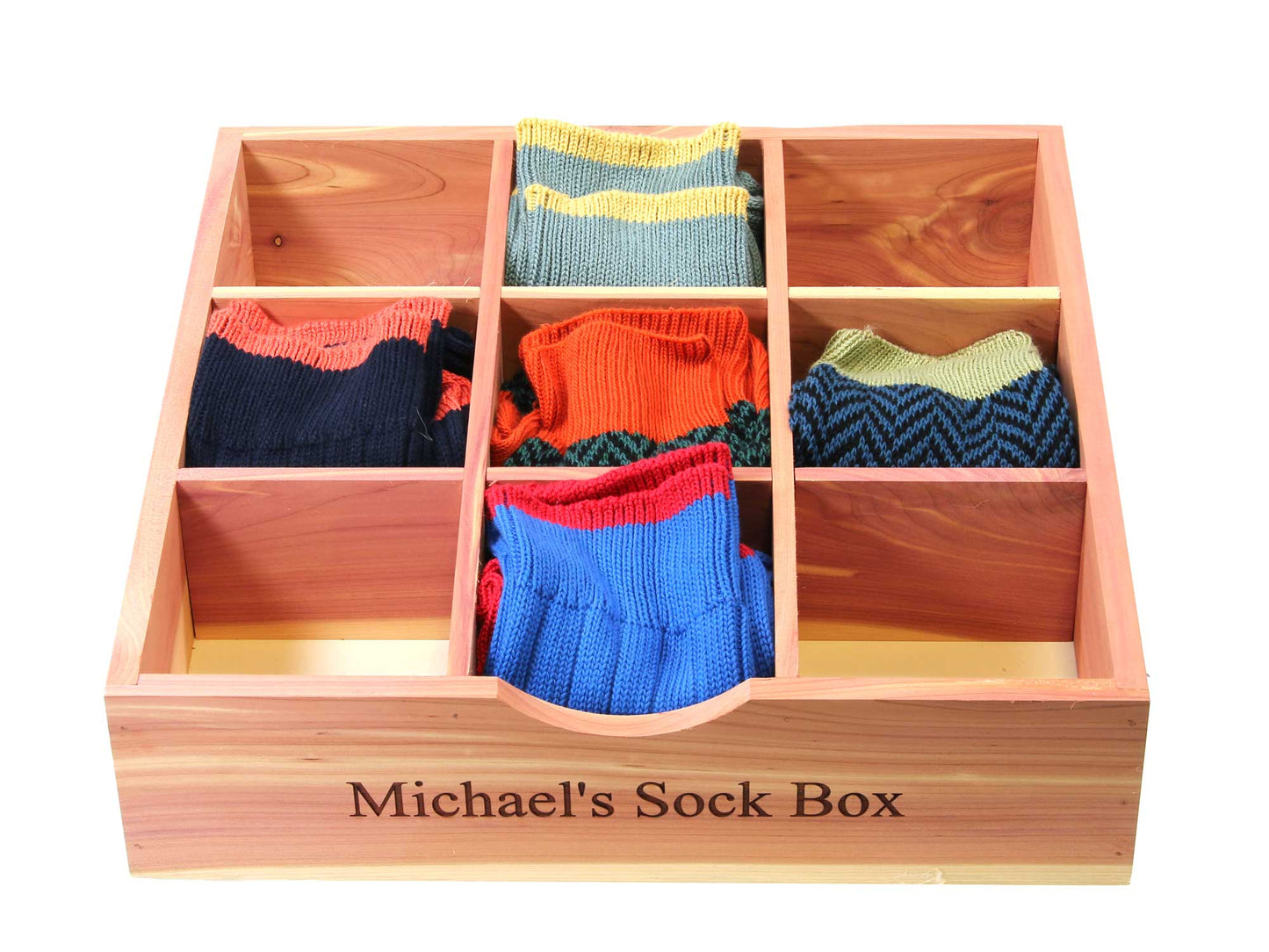 The Cathcart Elliot Cedar Wood Multi-Purpose Drawer Organiser (31cm x 31cm) neatly stores socks, ties, jewellery, watches, and accessories in nine compartments—ideal as a stylish display tray or organiser for your drawers.