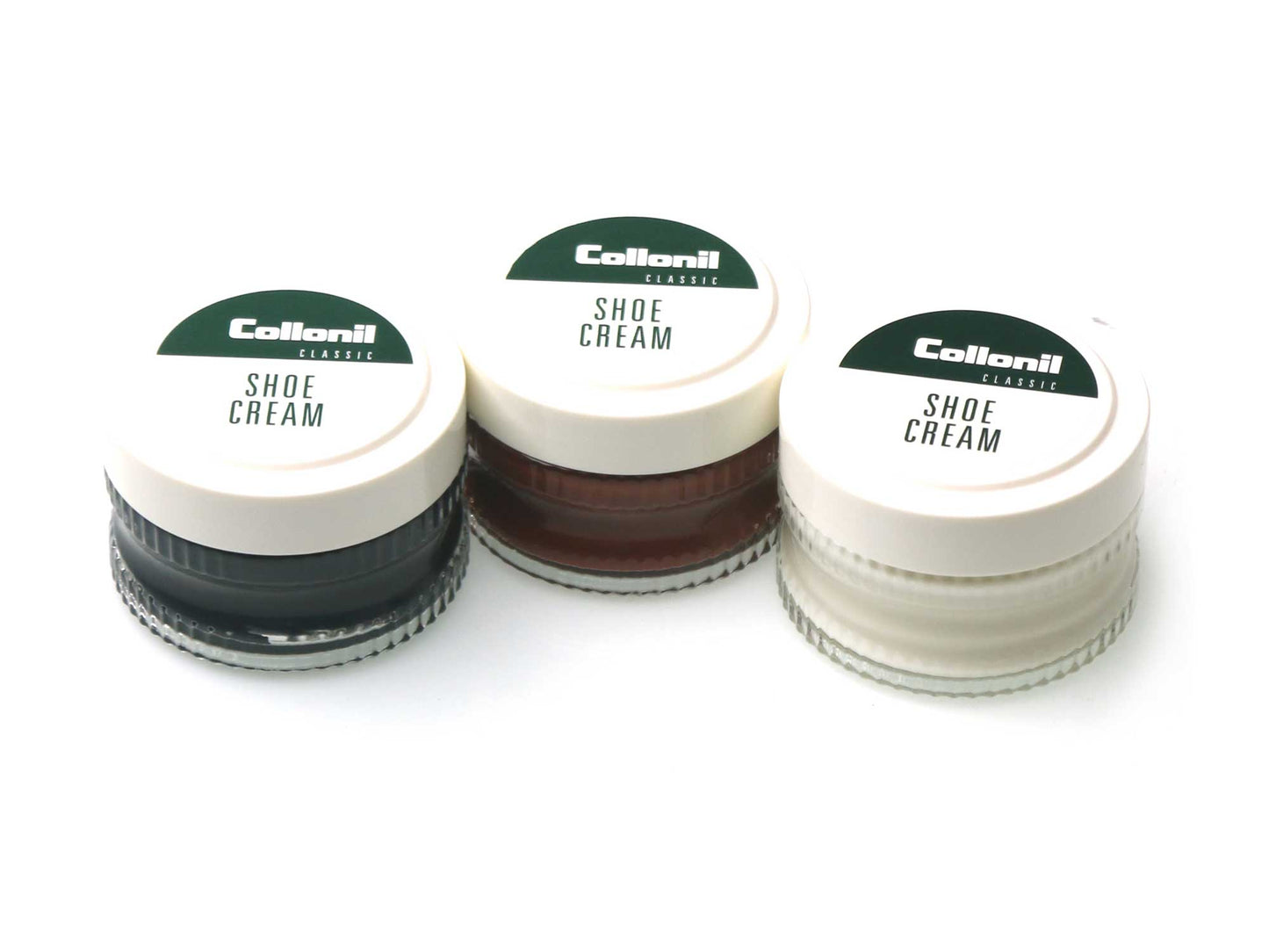 Three jars of Cathcart Elliot Collonil Shoe Cream Glass Jar 50ml in dark green, brown, and white sit in a row on a white background—ideal for conditioning and polishing your leather shoes.