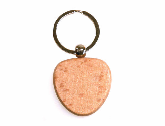A personalized heart-shaped keyring by Cathcart Elliot, featuring a silver metal ring attached to a beech wood design, is set against a white background.