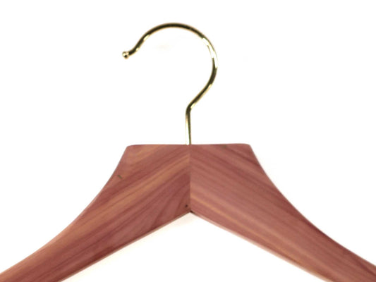 The Personalisable 48cm cedar wood suit and jacket hanger by Cathcart Elliot features a gold hook, bringing elegance to your closet.