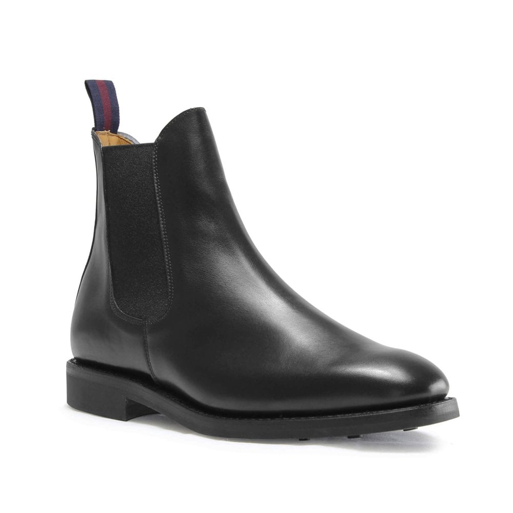 The LIAM Mens Black Calf Chelsea Boot by Sanders features a rounded toe, elastic side panels, low heel, and a pull tab with red and blue stripes—an essential black leather boot for mens style.