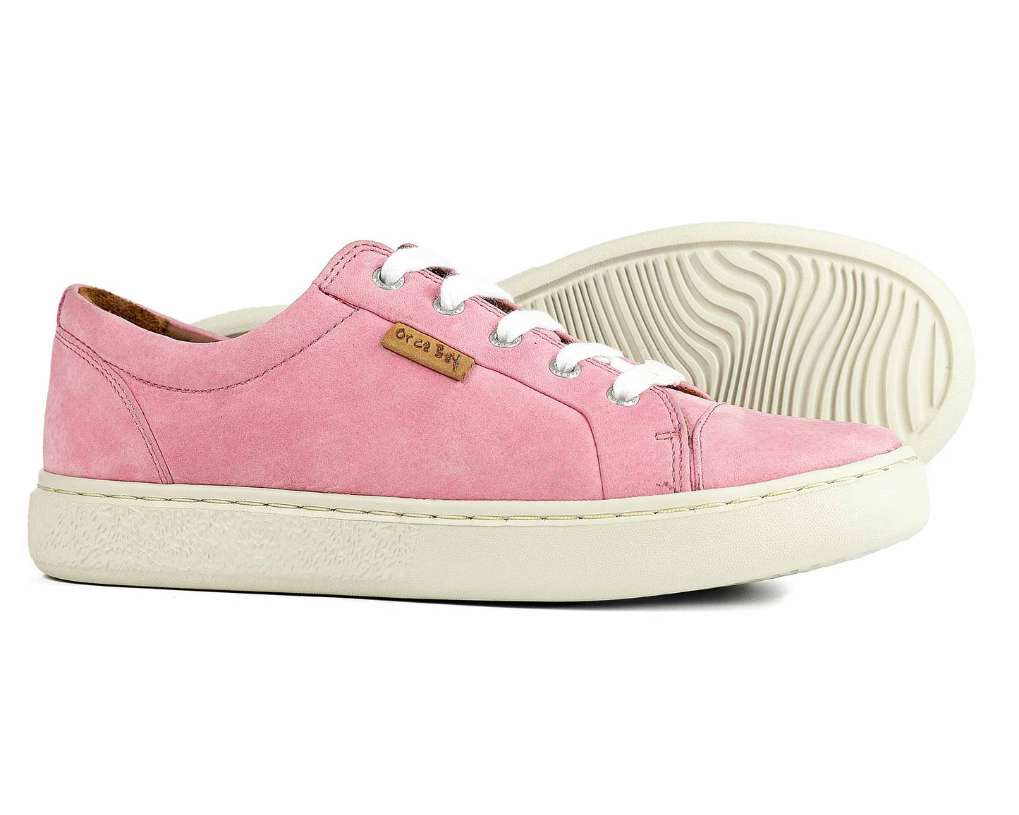 The MAYFAIR Ladies Sneakers Pink by Orca Bay feature pink nubuck, white laces, thick rubber soles, and a tan leather tag with the brand name. One shoe stands upright and the other lies on its side, ideal for summer comfort.