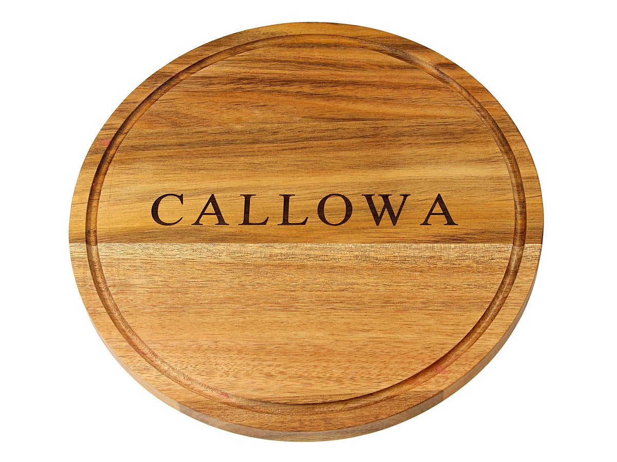 The Cathcart Elliot Personalised Round Acacia Wood Steak Plate Cheese and Cutting Board (25cm x 1.5cm) features “CALLOWA” engraved in capitals, perfect as a sustainable serving board or cheese platter.