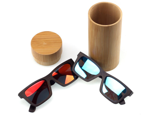 Two pairs of Cathcart Elliot Personalised Floating Bamboo Polarised Sunglasses with red reflective lenses are displayed next to their open bamboo case, all on a white background.