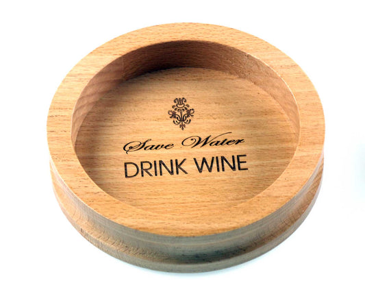 The Cathcart Elliot Personalised Wine Bottle Coaster is crafted from beech wood and engraved with Save Water, DRINK WINE—an ideal gift for wine lovers.