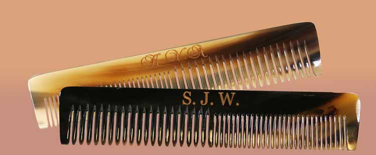 Two brown tortoiseshell combs with initials engraved on them, LVA on the top comb and SJW on the bottom comb, against a gradient beige background.