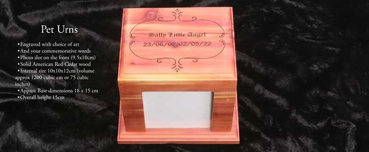A wooden pet urn on a black background, engraved with swirls and dates, featuring a customizable photo slot. Made from solid American Red Cedar wood, dimensions and product details are listed alongside.