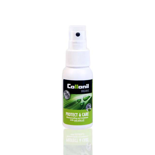 A 50ml Collonil Organic Protect & Care spray bottle, featuring a white design with green elements and eco-friendly ingredients like aloe vera and olive oil, provides excellent leather protection against a plain background.