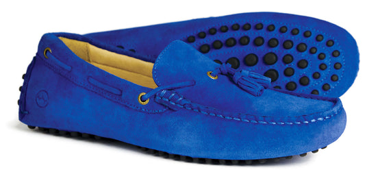 Orca Bay Monaco Tassel Driving Shoes in Royal Blue (EU 41/UK 7), featuring suede uppers, tassels, and black rubber nubs on the soles; shown with one shoe on its side and the other upright.