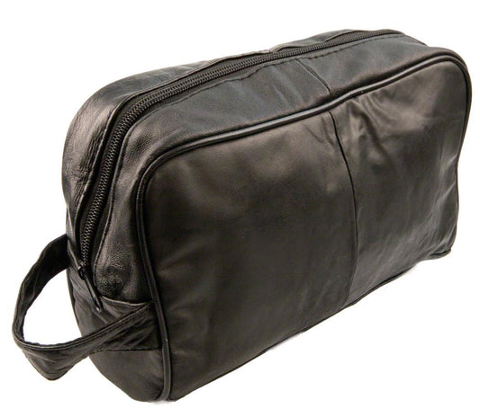 The large leather washbag from Cathcart Elliot in black features a zippered top, side handle, and sleek rectangular design with a smooth texture, positioned to highlight the front and side.