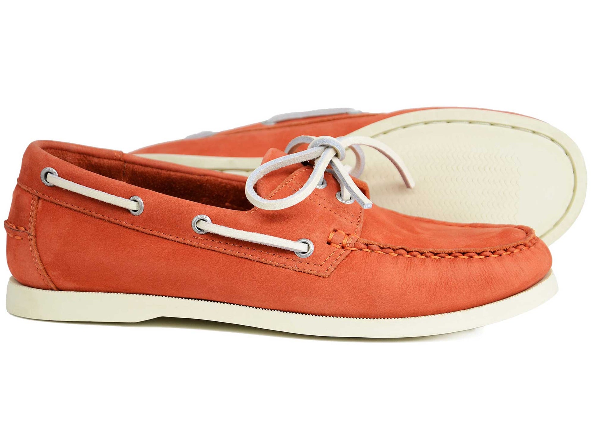 A pair of Orca Bay Ladies Sandusky Orange Nubuck Boat Shoes in washable leather, featuring white soles and laces. One shoe stands upright; the other lies on its side, showing off the sole.