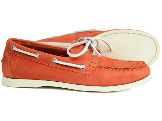 A pair of Orca Bay Ladies Sandusky Orange Nubuck Boat Shoes in washable leather, featuring white soles and laces. One shoe stands upright; the other lies on its side, showing off the sole.
