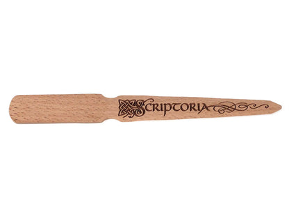 wooden letter opener with scriptoria design reminiscent of book of kells