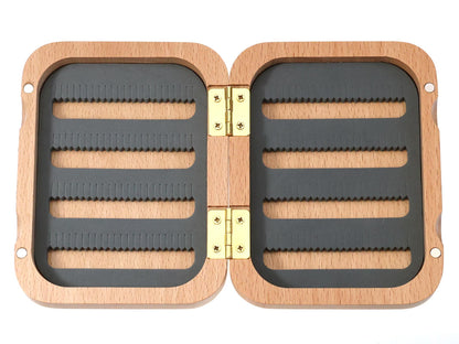 A Cathcart Elliot Personalised Beech Wood Fishing Fly Box for Salmon and Trout features a rectangular, hinged design crafted from beech wood with gold-colored metal hinges. Viewed from above, the box reveals parallel black grooved inserts perfect for organising flies, making it an ideal tackle box for fly fishing enthusiasts.