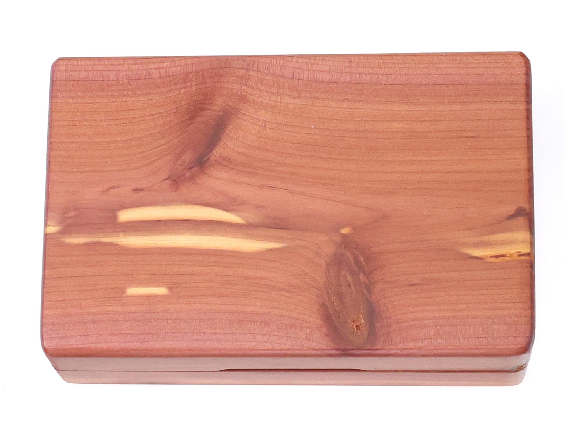 A handcrafted pocket-size cedar wood fishing fly box by Cathcart Elliot, featuring a rustic finish and distinctive natural grain patterns, is displayed in this rectangular design viewed from above on a white background—making it an ideal personalised gift for anglers.