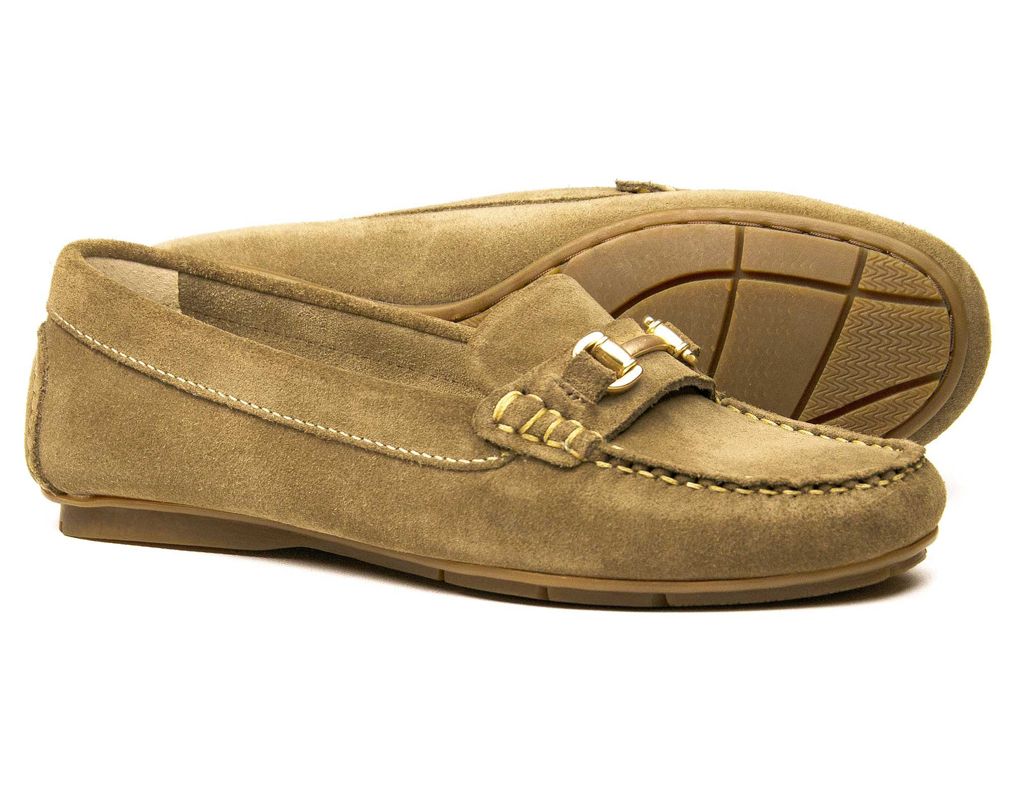 The SALE CHELTENHAM Womens Light Brown Mushroom Nubuck Buckle Loafers by Orca Bay have decorative stitching, metal accents, a flat heel, and non-slip textured rubber soles. One shoe stands upright while the other leans on it, revealing the sole design and elegant buckle detail.