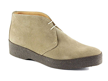 The HI TOP Mens Dirty Buck Suede Chukka Boot by Sanders offers timeless elegance with its beige suede, dark brown crepe rubber sole, two eyelets, and simple lace-up design, reminiscent of 007 Bond movies.
