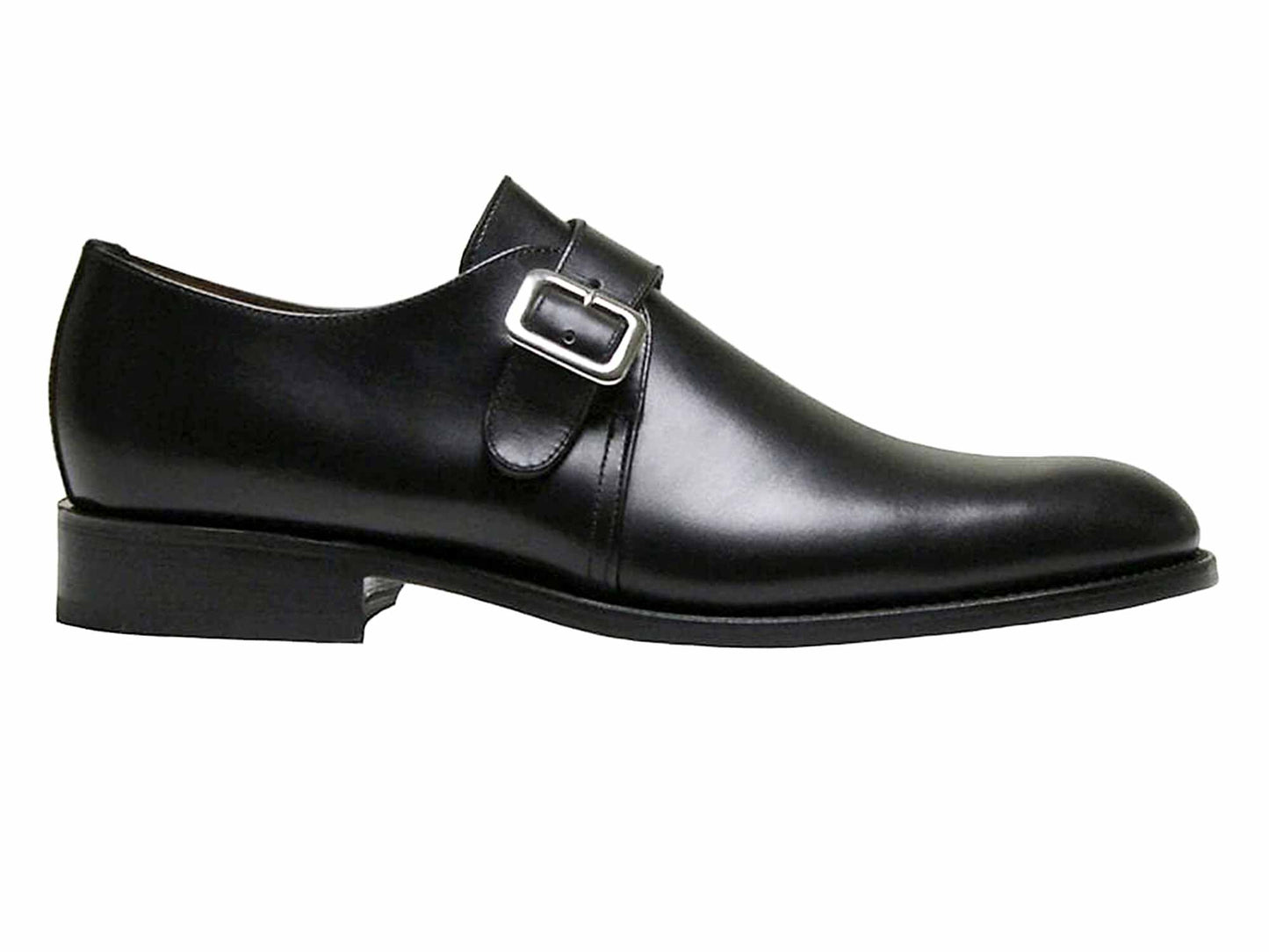 The Sanders Rome Black Leather Monk Strap Shoe – Goodyear Welted features a single silver buckle, low heel, and polished finish. Made in England by Sanders, it's from the Diplomats collection and shown side profile on a white background.