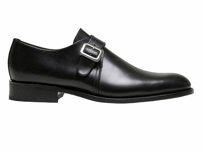 The Sanders Rome Black Leather Monk Strap Shoe – Goodyear Welted features a single silver buckle, low heel, and polished finish. Made in England by Sanders, it's from the Diplomats collection and shown side profile on a white background.