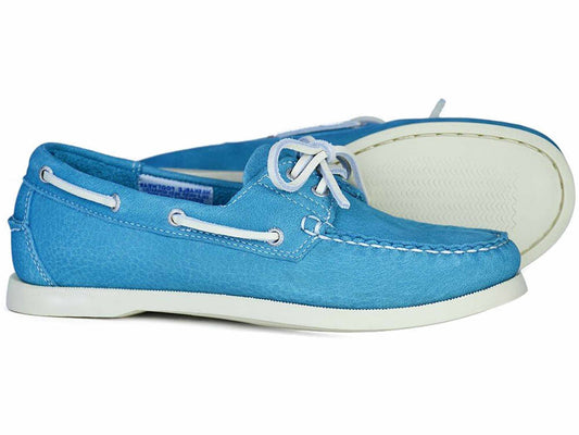 The SANDUSKY Ladies Aqua Blue Deck Shoes by Orca Bay feature white laces and soles, visible stitching, and side eyelets for a nautical vibe. One shoe stands upright while the other lies on its side.