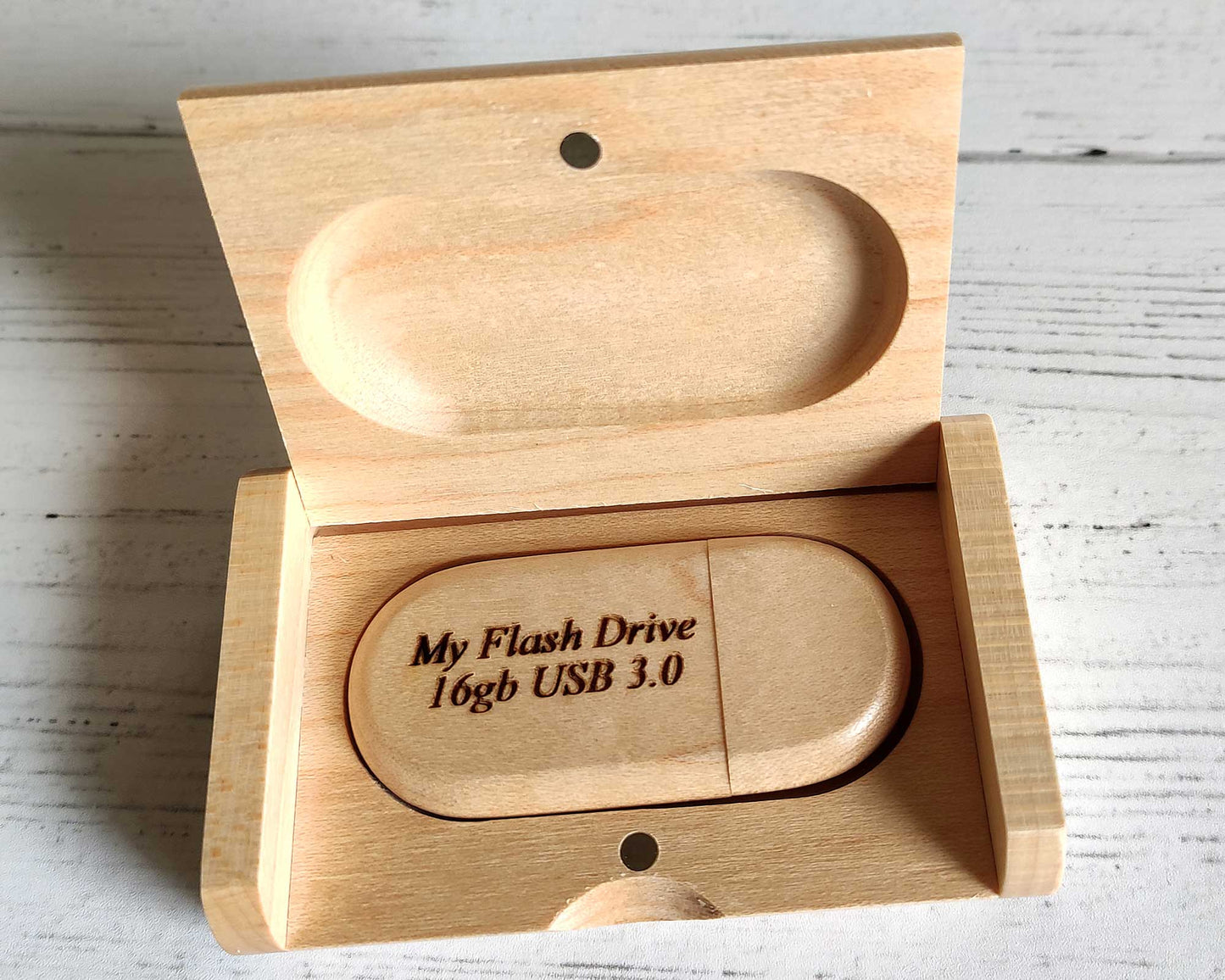 A Cathcart Elliot maple wood USB 3.0 32GB flash drive is displayed in an open wooden presentation box with a hinged lid, engraved My Flash Drive, against a white wood background.